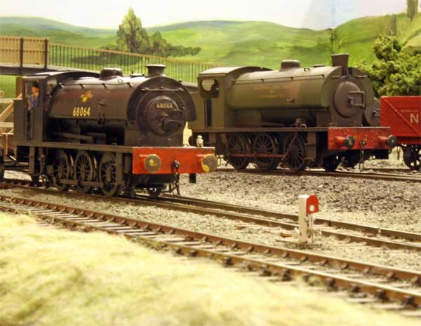 A contrast in Austerity 0-6-0STs, A BR J94 and a Giesl fitted NCB locomotive in the Colliery.